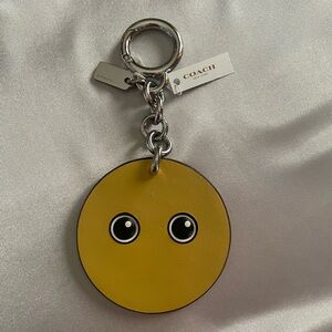 Coach Yellow “silent “ emoji Keychain with Silver Accents